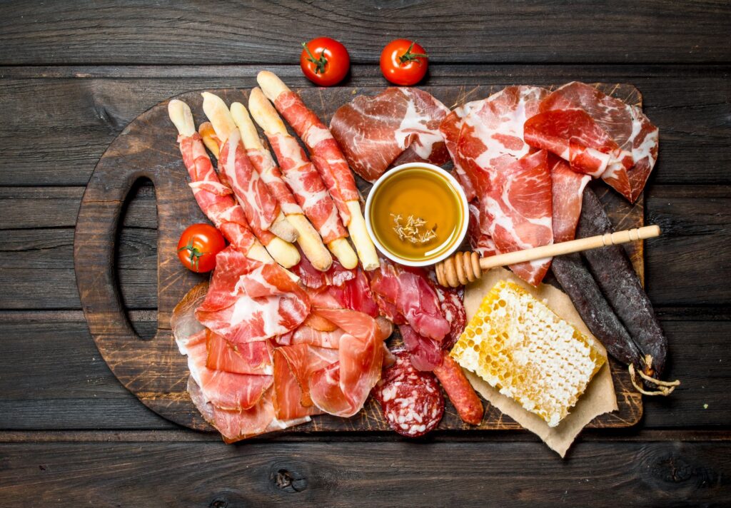 Antipasto background.A variety of meat snacks.