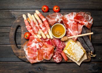 Antipasto background.A variety of meat snacks.